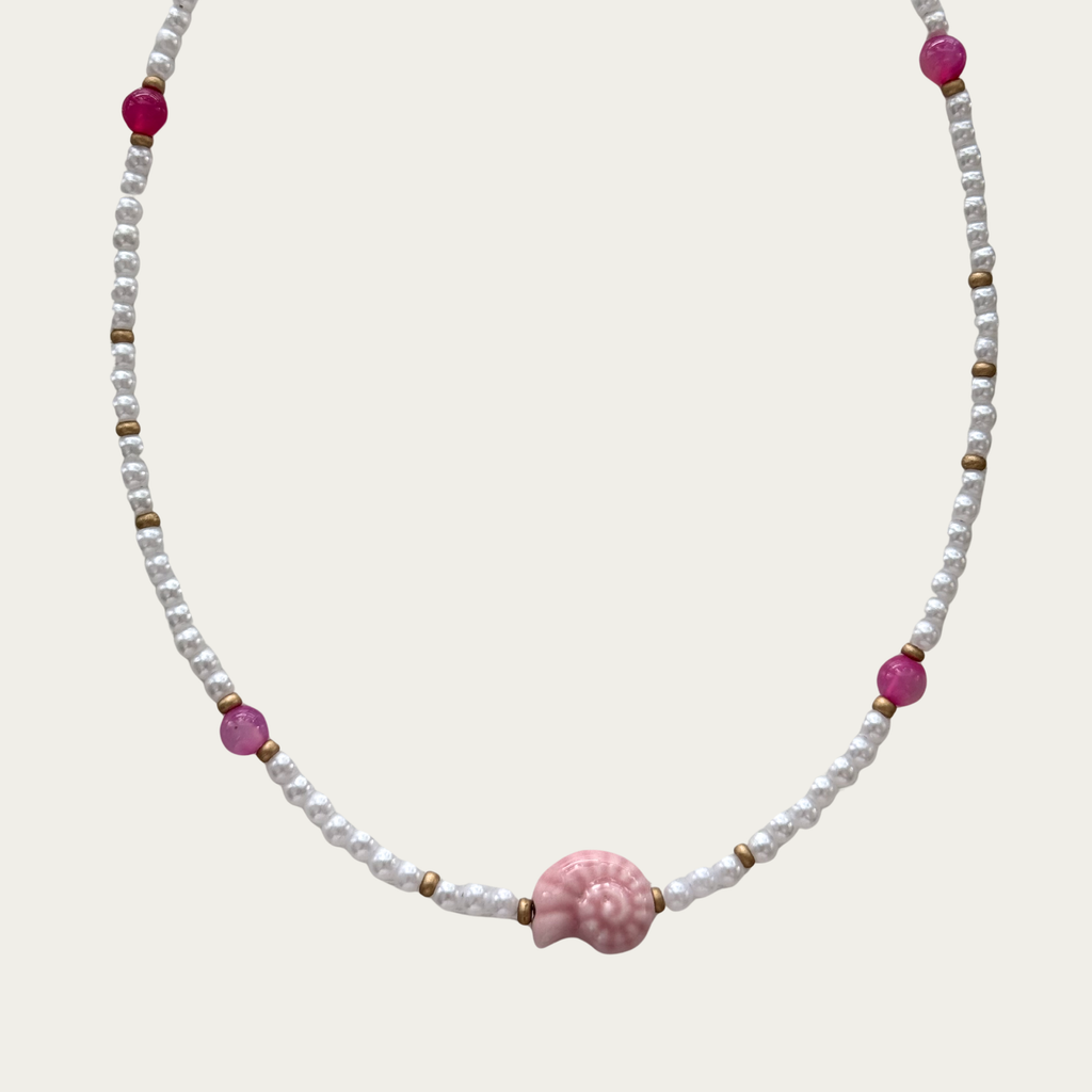 Collar de perlas con caracol rosa o azul
