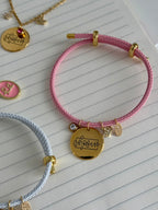 Pulsera rosa ELEGIDA oro (ajustable)
