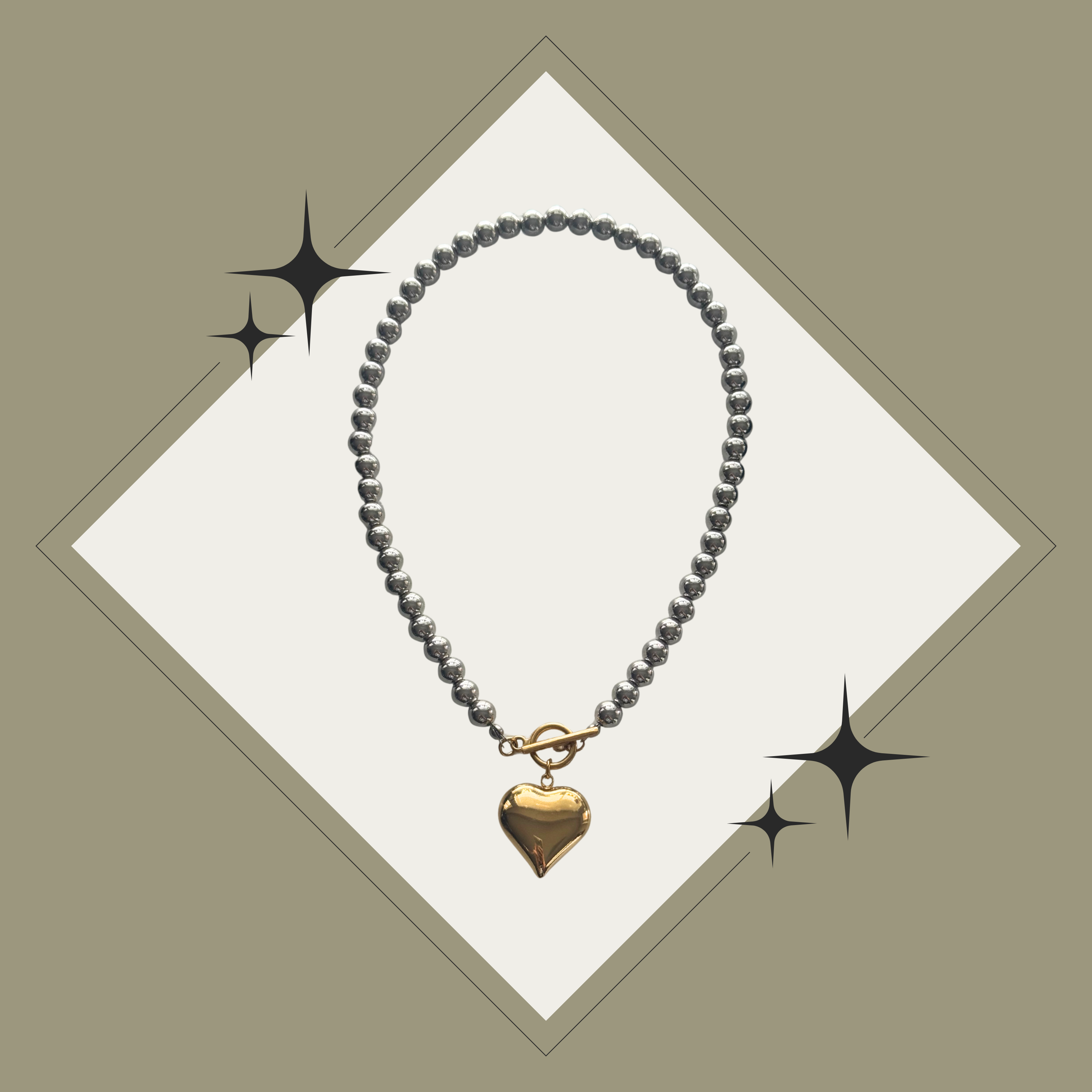 Collar de balines en plata con corazón oro