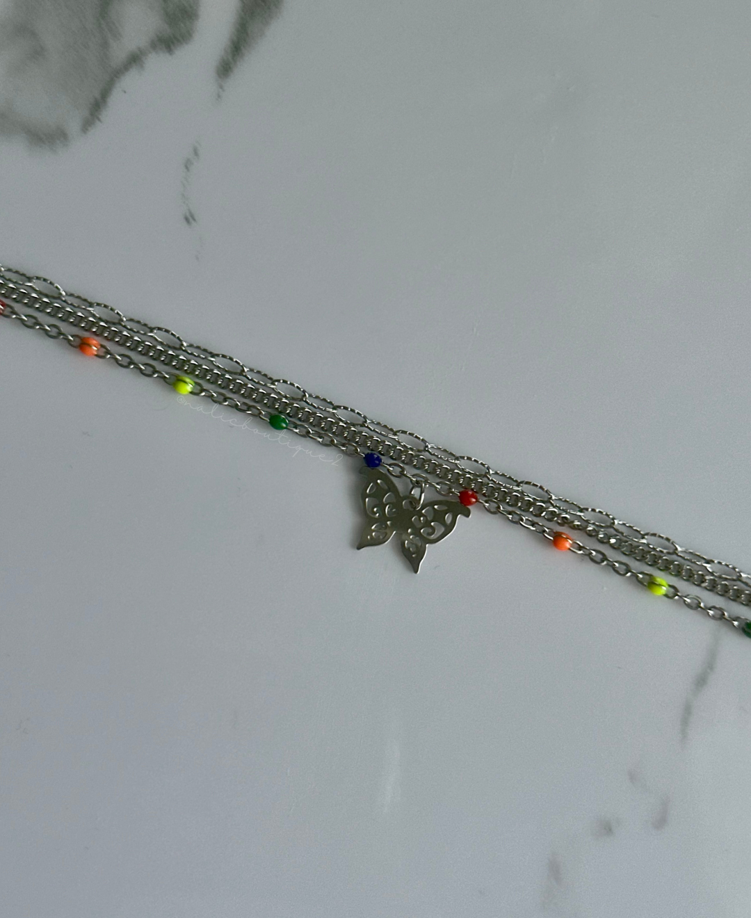 Tobillera de tres cadenas con mariposa plata Stainless Steel