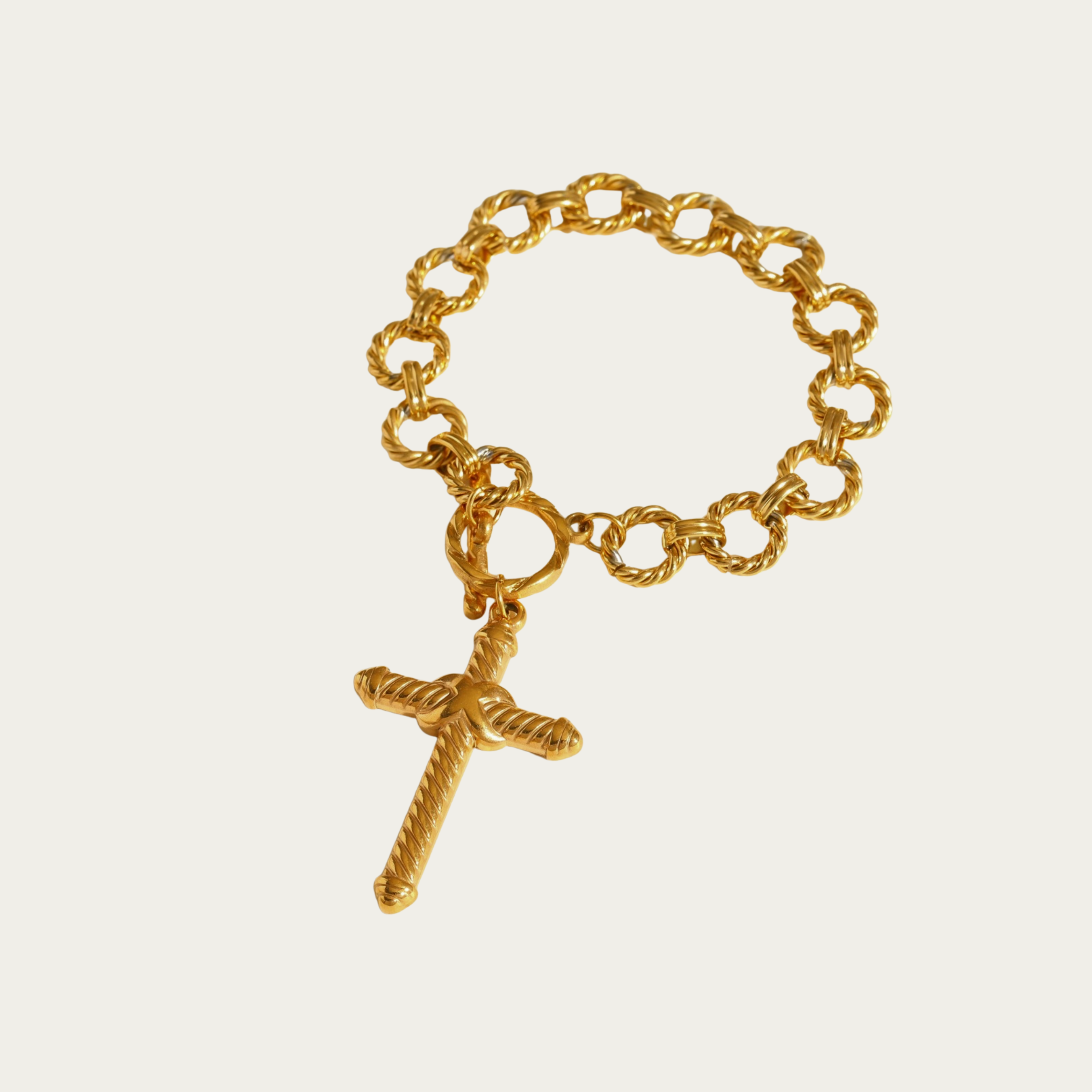 Pulsera de cruz con cadena ancha y cierre redondo al frente