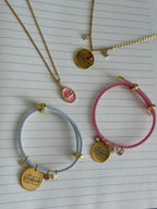 Pulsera rosa ELEGIDA oro (ajustable)