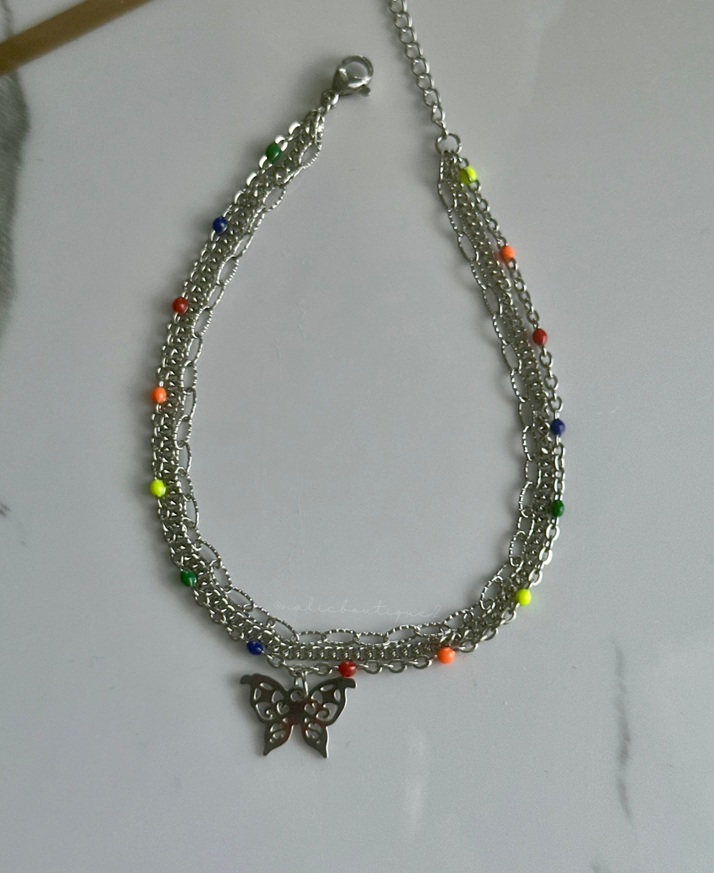 Tobillera de tres cadenas con mariposa plata Stainless Steel