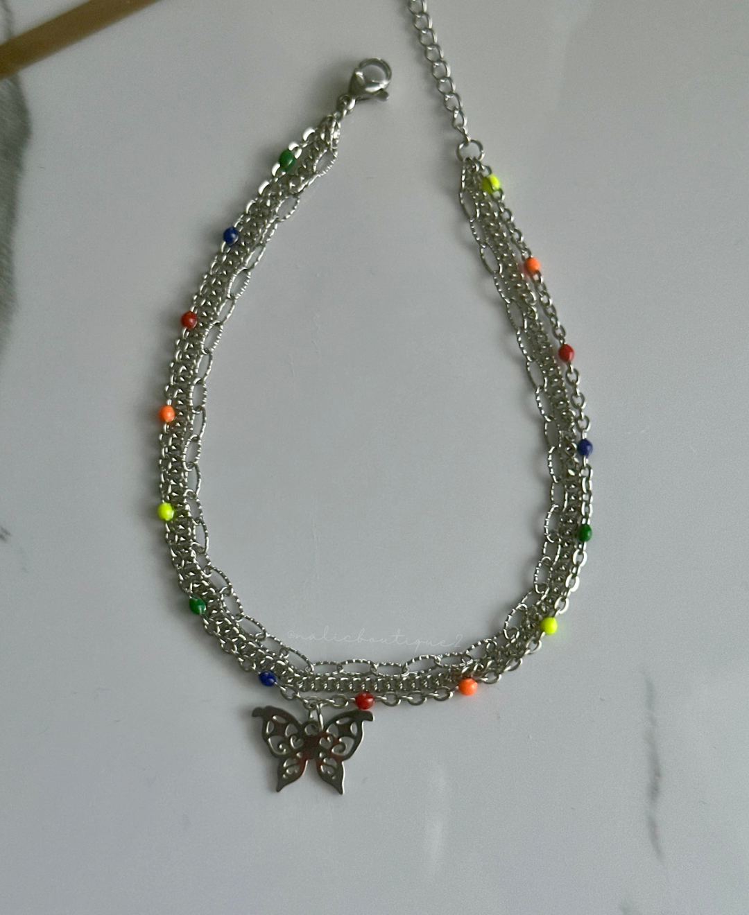 Tobillera de tres cadenas con mariposa plata Stainless Steel